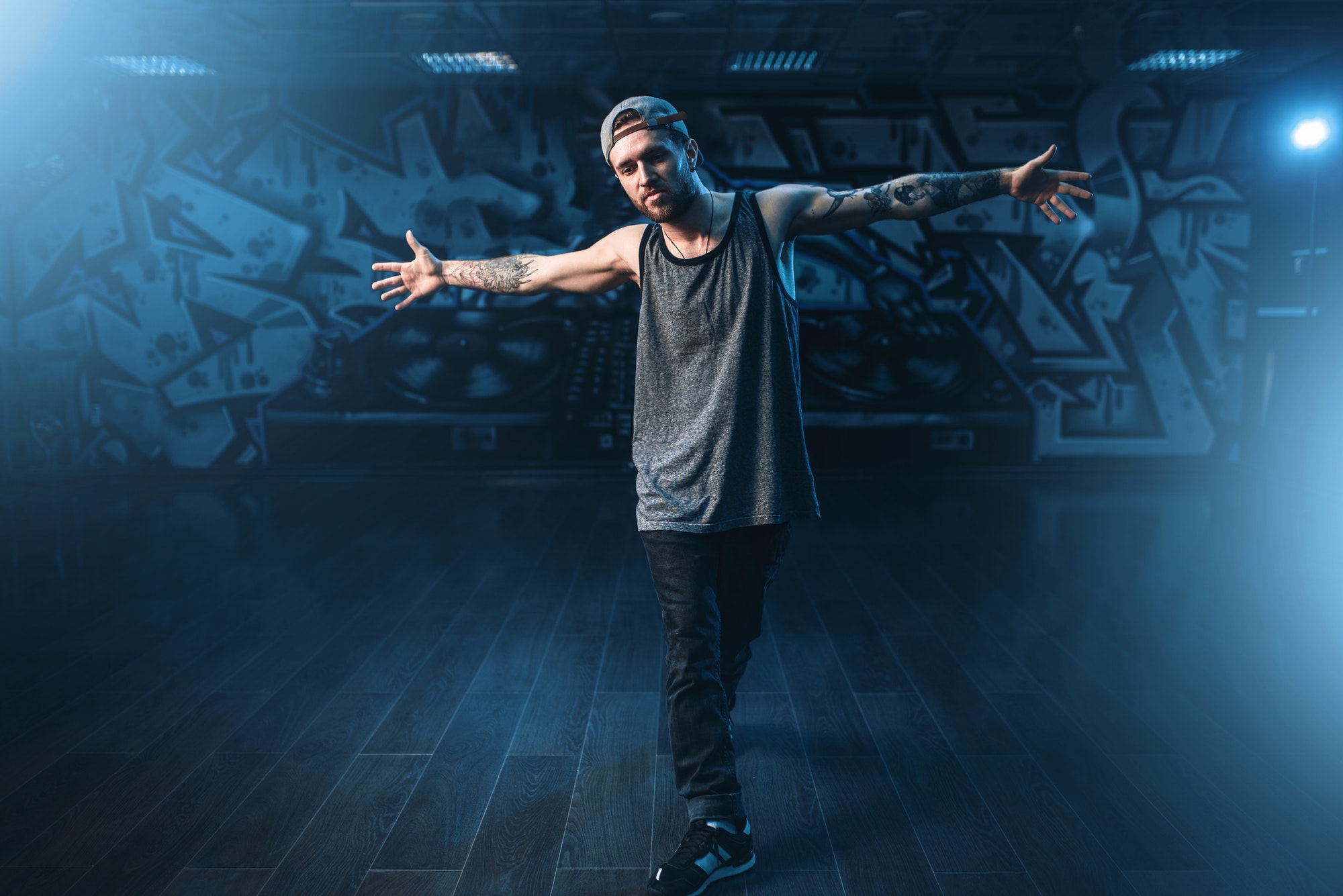Male rapper in dance studio, trendy lifestyle